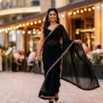 black saree caption for instagram